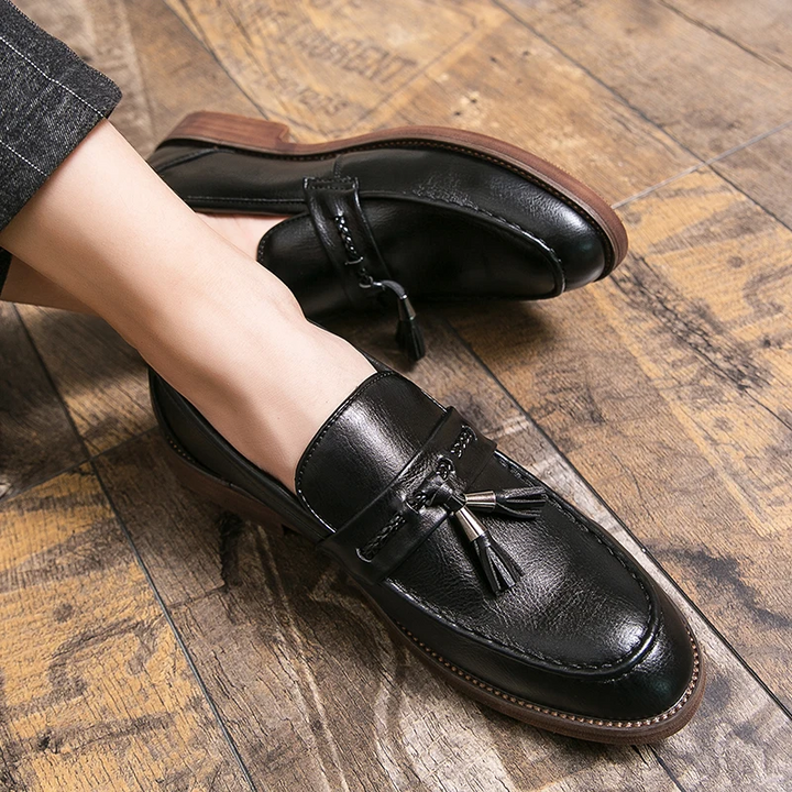 Mocasines de piel con borlas