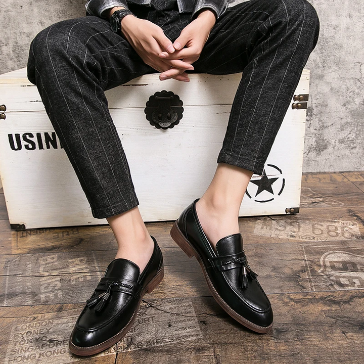 Mocasines de piel con borlas